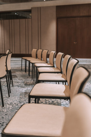 Row of chairs in conference hall. Business meeting concept. Selective focus.
