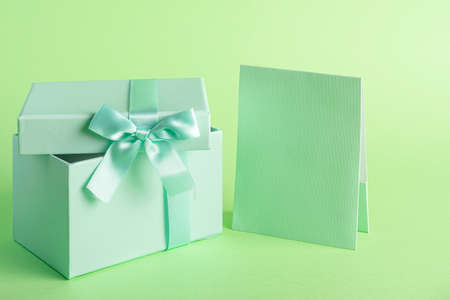 This photograph aims to show concepts of affectivity between people. It is taken in studio with artificial light and a green hue.の写真素材