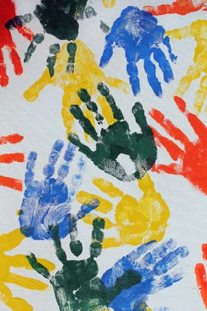 Colorful hand imprints in various shapes and patternsの写真素材