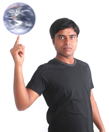 Young person spinning world on his fingertip. World image courtesy: www.nasa.govの写真素材