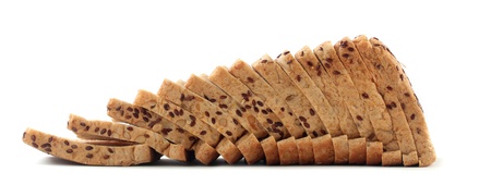 Healthy & nutritious multigrain bread slices with flaxseeds and pumpkin seeds on white backgroundの写真素材