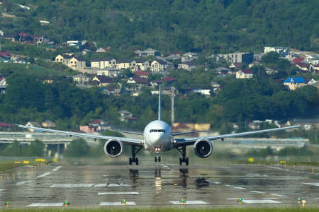 airplane taking off in the backgroundの写真素材