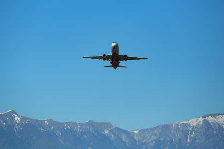 airplane taking off in the backgroundの写真素材