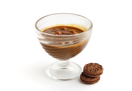 Chocolate dessert with nuts and biscuits isolated on whiteの写真素材