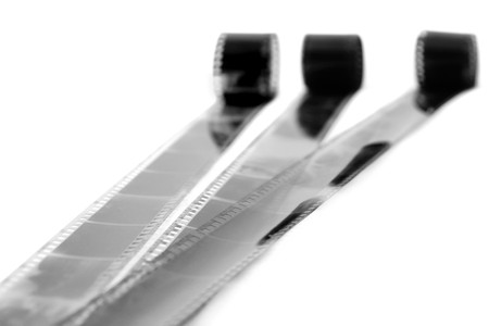 Black and white film strips isolated on whiteの写真素材
