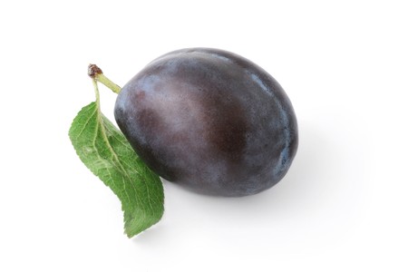 Ripe plume with green leaf isolated on white backgroundの写真素材