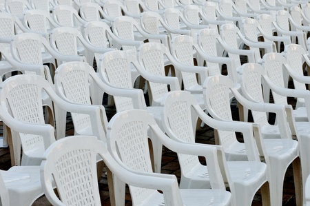White plastic empty chairs in an open air cinema or theatreのeditorial素材