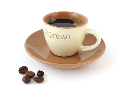 Coffee in the cup with saucer and coffee-beans on white background の写真素材