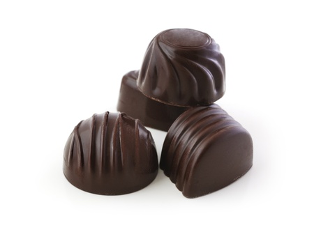 Delicious chocolate candies on white background の写真素材
