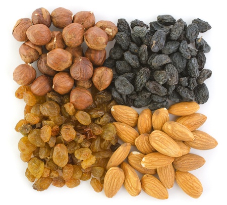 Hazelnuts, raisins and almonds in the square shapeHazelnuts, raisins and almonds in the square shapeの写真素材
