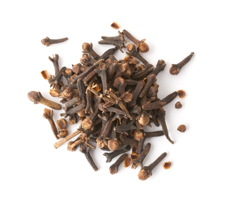 Heap of cloves isolated on white  Top view の写真素材