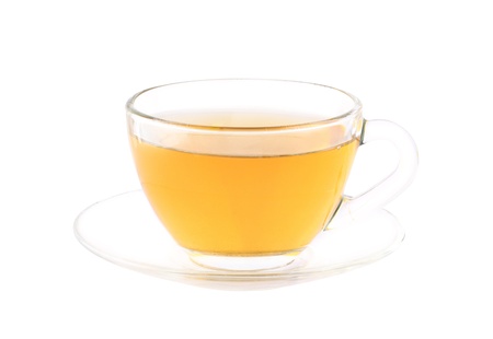 Hot green tea in a glass cup isolated on white  の写真素材