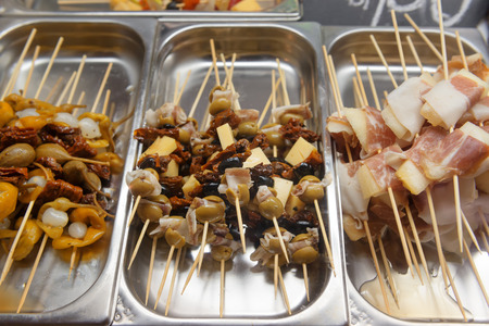 Street food snacks with meat and vegetablesの写真素材