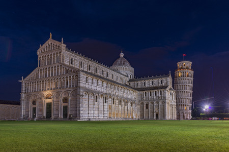 Pisa tower, baptistery and cathedral at night. World known tourist attraction, symbol of Italyの写真素材