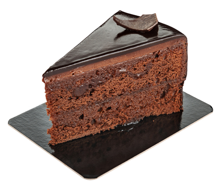 Piece of sweet chocolate cake on a paper plate isolated on white. Delicious dessert.の写真素材