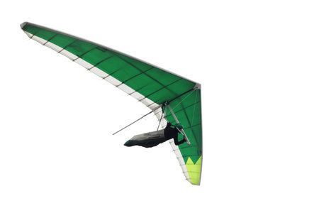 Green hang glider wing isolated on white. Extreme action sport