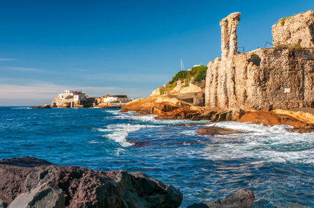 Seaside and historic buildings in Napoli bay. Summer vacation in Italy