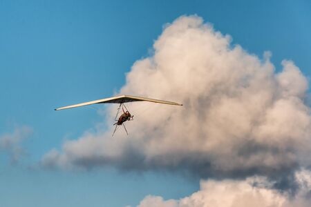 Hang glider wing with small engine. Ultralight planeの写真素材