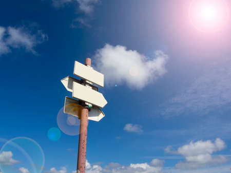 Blank arrow pointers on the pole. Direction marks on the mountain top.の写真素材