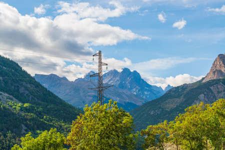 Power lines in the mountain region. Energy transmission in alpine evironmentの写真素材