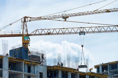 2021-05-21 Kyiv, Ukraine. Workers on the construction site. Fast growing real estate development