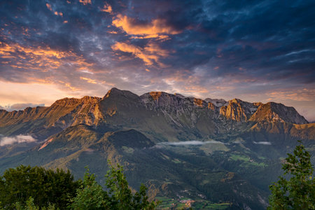 Mountain ridge with dramatic sky in Julian alps, Soca valley, Slovenia. Amazing mountain view. Composite skyの写真素材