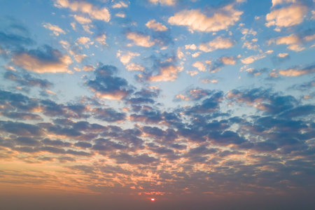 Cirrus clouds on the sunset sky. Nature backgroundの写真素材