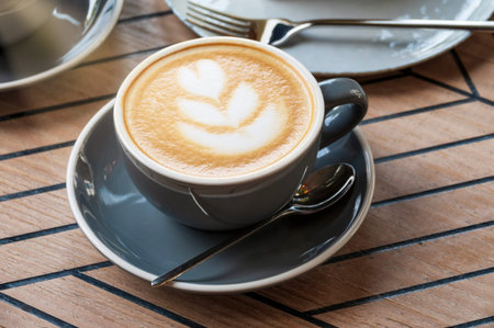 Delicious morning cup of cappuccino in a cafe