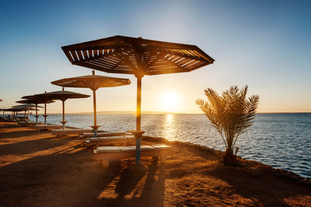 Amazing sunrise on an empty beach, a resort on the Red Seaの写真素材