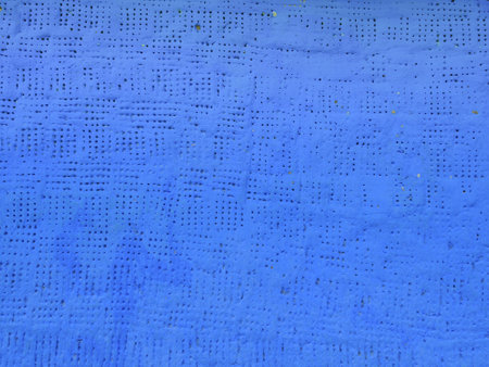 Blue painted clay plaster wall texture. Traditional house wall ethnic backgroundの写真素材