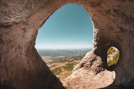 Cave with a view in Serra del Montsec, Ager, Spain. 
Landscape in Pyrenees mountains.の写真素材