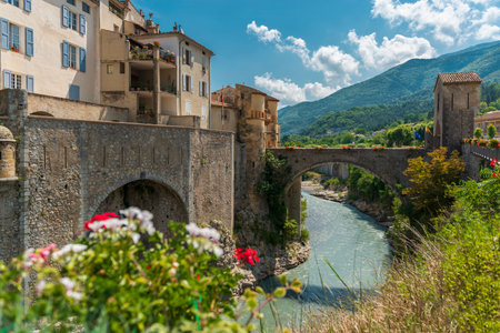 Entrevaux. Picturesque old town on the river with arch stone bridge in Provence, Franceのeditorial素材