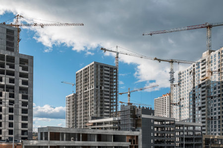 Huge construction site with cranes. Development industry. Fast growing city district