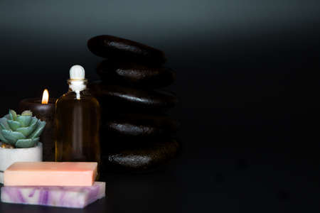 spa still life with candles on a black backgroundの写真素材
