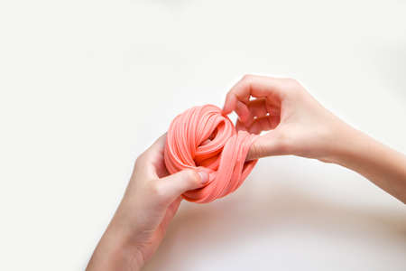 kids hands playing slime toy.の写真素材