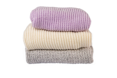 Folded sweaters on an isolation backgroundの写真素材