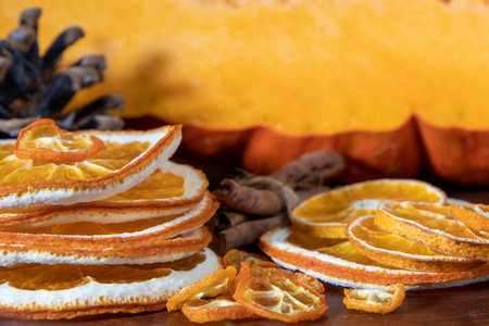 Dried slices of oranges, cinnamon sticks, pine cone, Christmas concept.の写真素材
