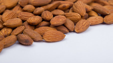 heaps of almonds, close view, nutsの写真素材