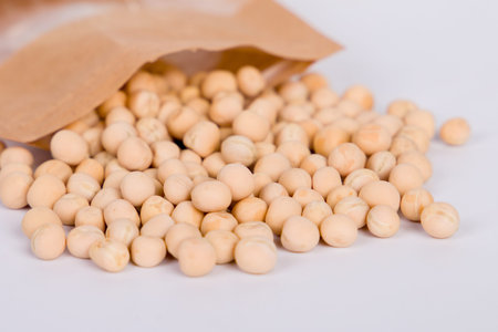 Pea seeds, close-up view, packaging, selective focus.