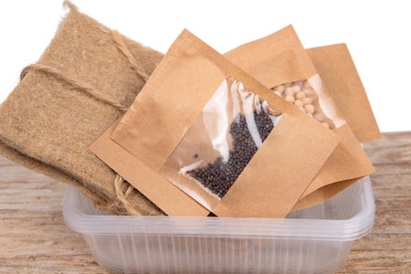Set for growing microgreens. Seeds, plastic container and linen mats.