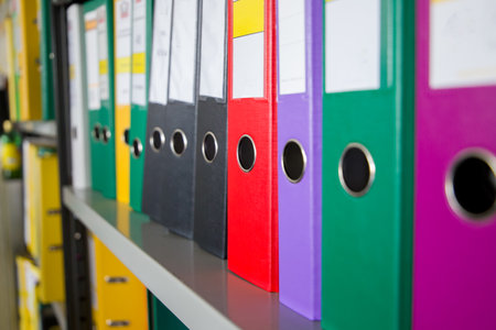 Office folders on the shelves in the office. selective focus.の写真素材