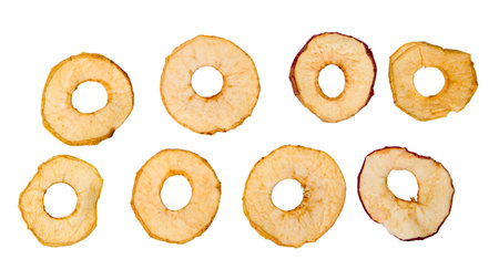 Dried apple slices isolated on white background. Top view. Flat lay.
