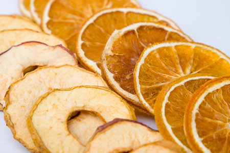 Dried orange and dried apple fruit slices. Close-up.の写真素材
