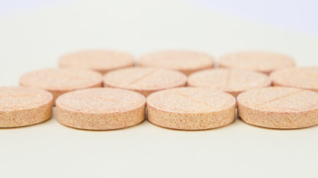 Close up of pills on white background. Focus on foreground, shallow DOF.