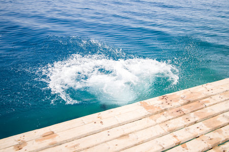 Wooden pier and blue sea.の写真素材