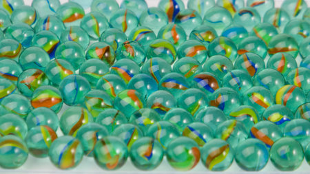 Colorful marbles as a background. Close-up shot.の写真素材
