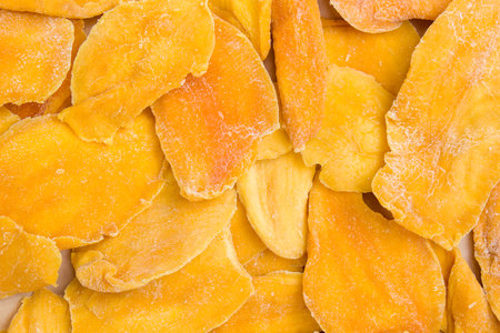 Dried mango slices. Close-up. Top view.の写真素材