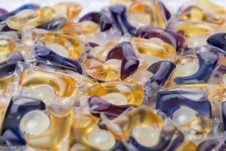 Background of multicolored washing gel capsules. Selective focus.の写真素材