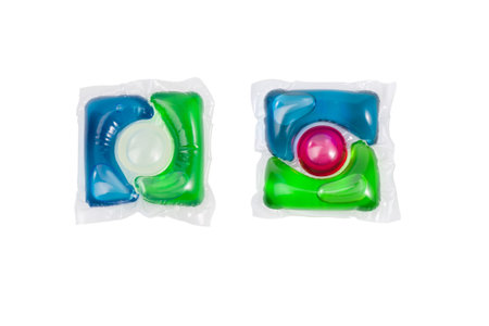 Laundry gel capsules. For colored laundry. Isolated on white.