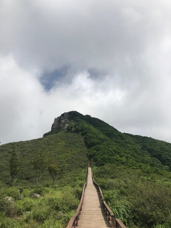 cloudy mountain ridge deck pathの写真素材